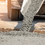 concrete being delivered to road works